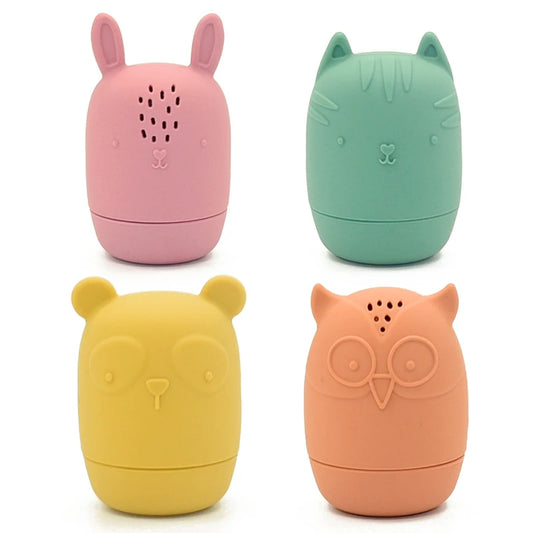 Lot de Quatre Jouets de Bain en Forme d'Animaux sur fond blanc